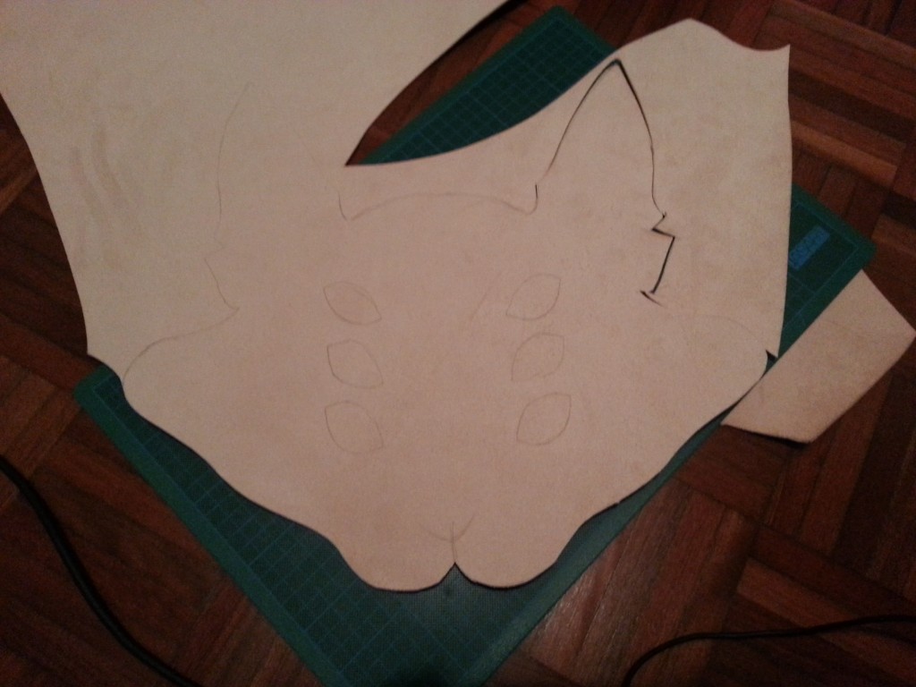 Cutting the leather using a sharp blade and a cutting board...